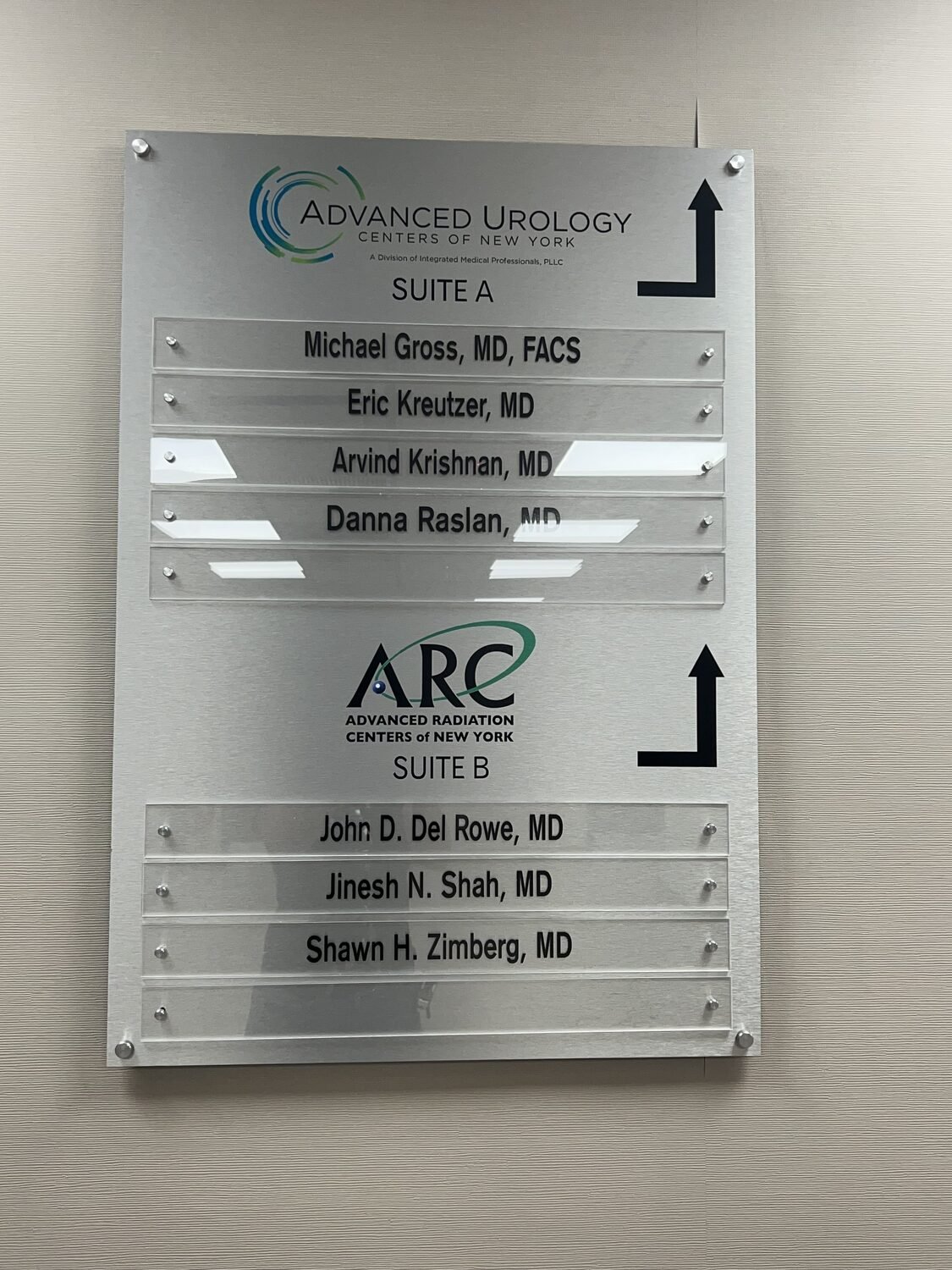 Suite directory with slide-in name strips for Advanced Urology Centers of New York