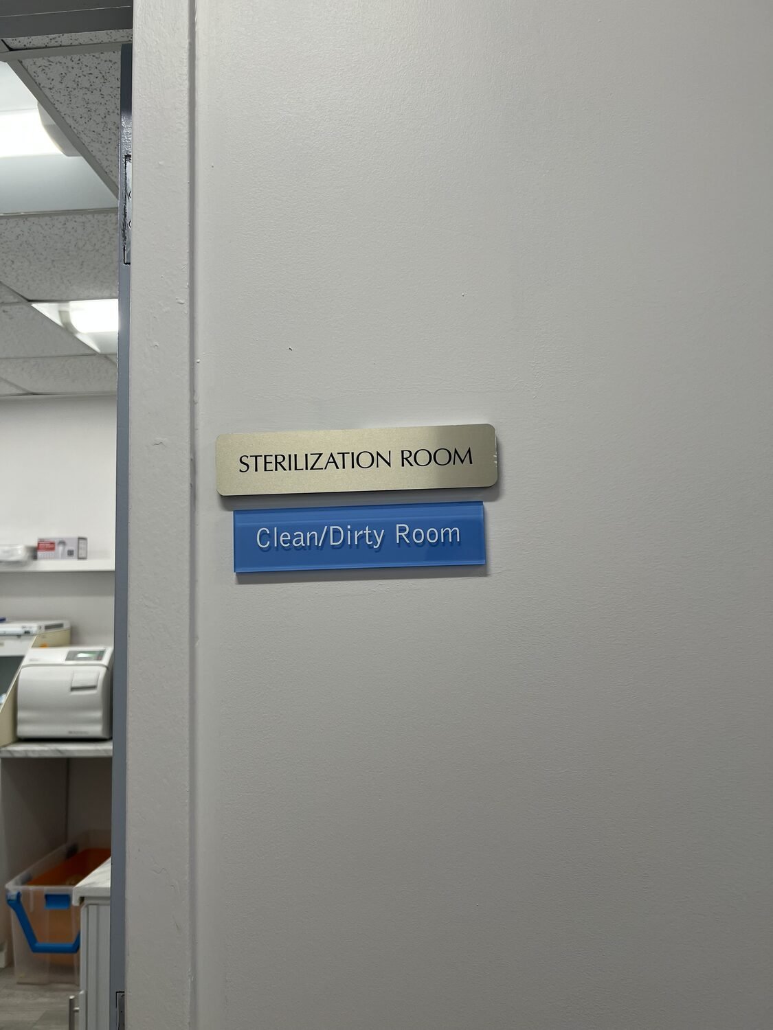 ADA room sign with tactile text for Medical office