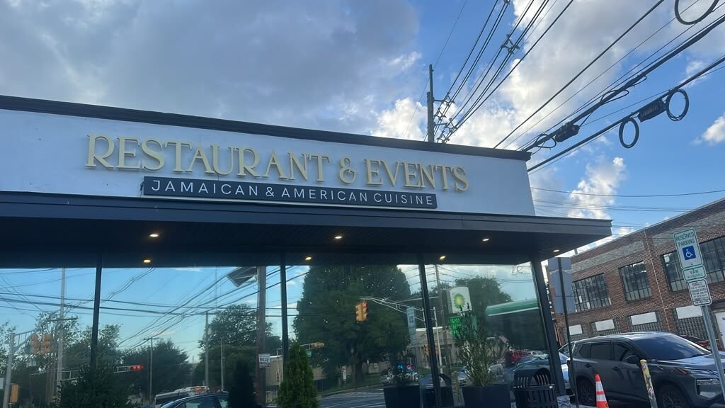 The same sign in daylight for Restaurant & Events