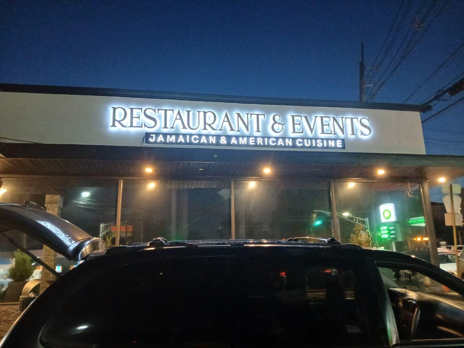 Backlit letters after dark for Restaurant & Events