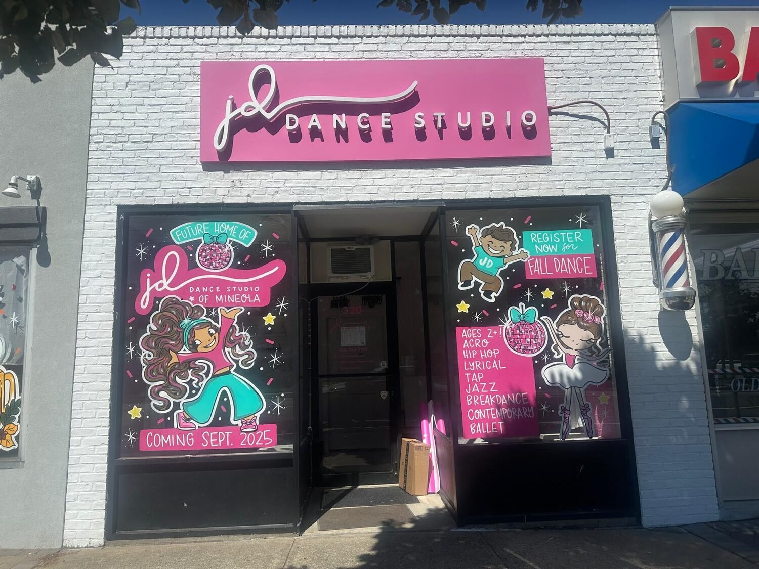 Illuminated storefront sign for JD Dance Studio