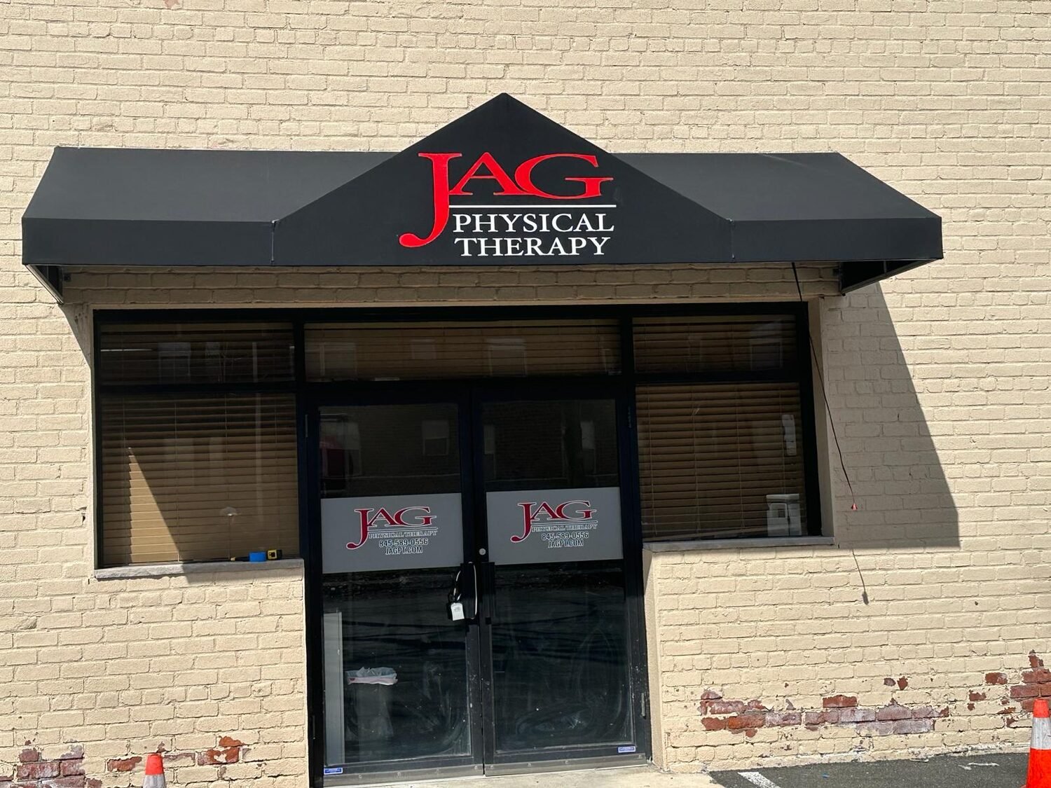 Canopy enclosure with printed logo for JAG Physical Therapy