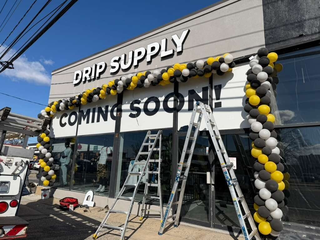 Channel letters on opening day for Drip Supply