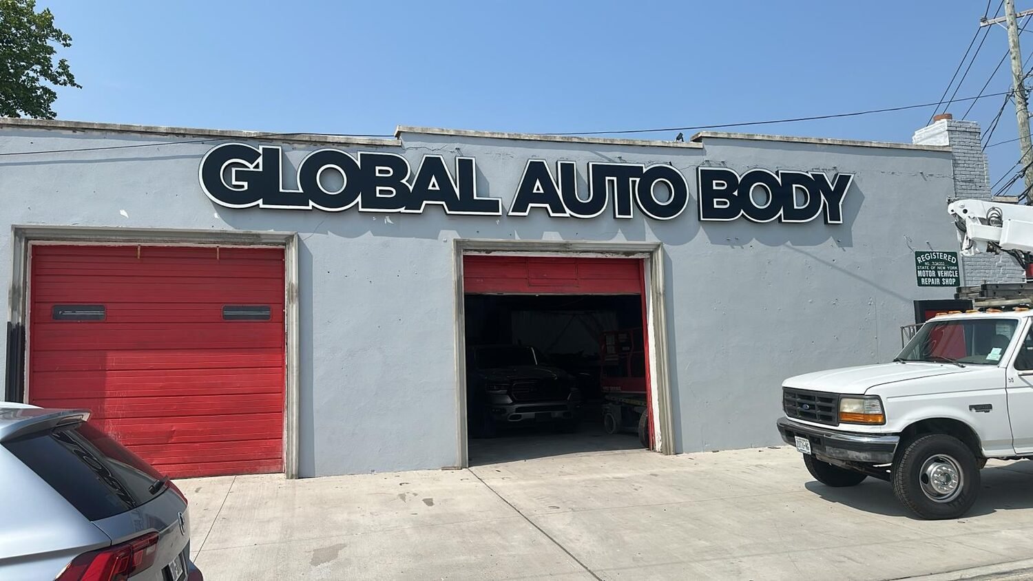 Channel letters on a repair shop for Global Auto Body