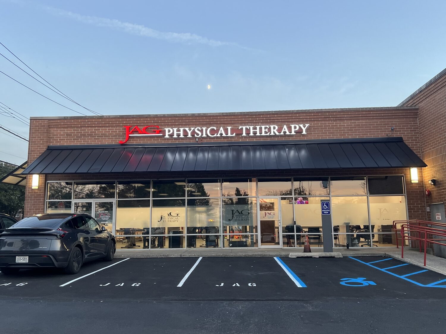 Channel letters across a brick facade for JAG Physical Therapy