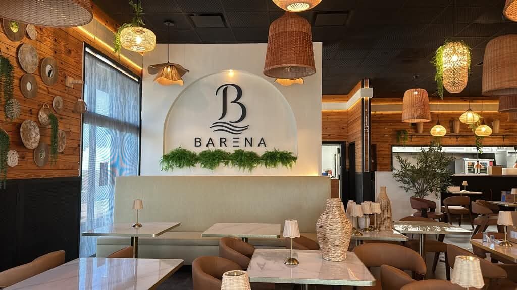 Dimensional logo behind the bar for Barena Kitchen & Cocktails