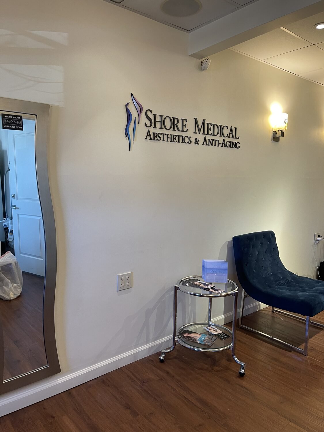 Reception wall logo for Shore Medical Aesthetics