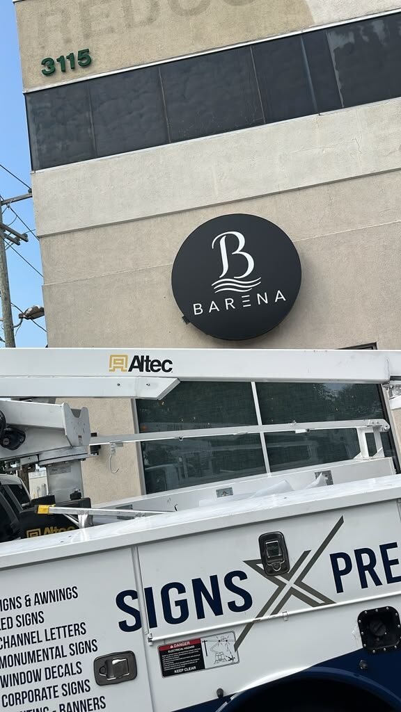 Light box install from the bucket truck for Barena