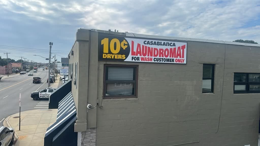 The same sign, up on the building
