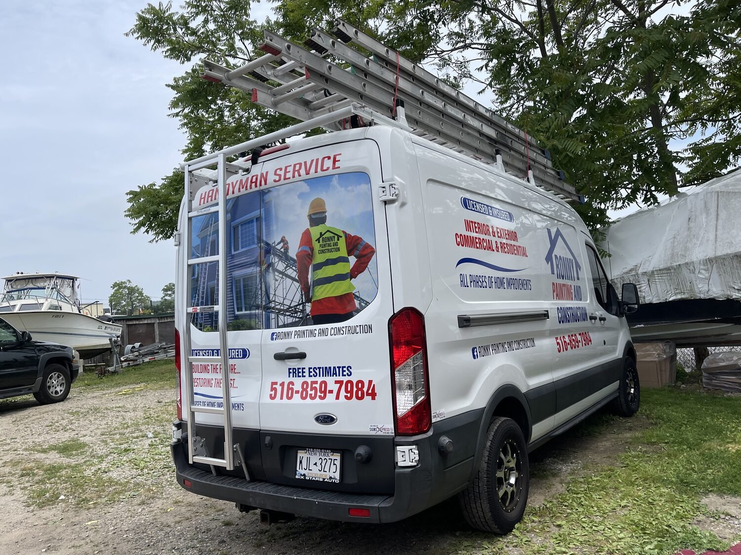 Rear door lettering for Ronny Painting & Construction