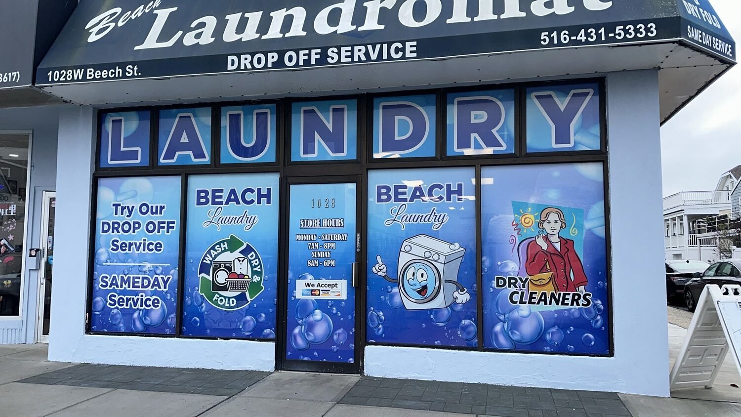Full-color window graphics for Beach Laundromat